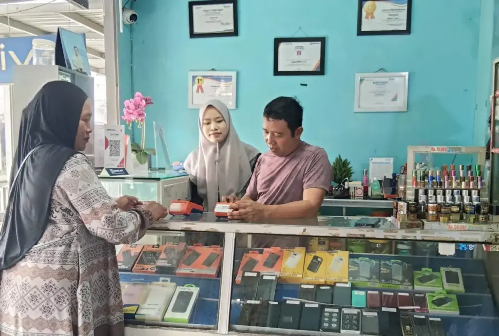 BRILink Agen Ijay, Dekatkan Bantuan Sosial kepada 2.000 Penerima Manfaat di Desa Jelapat Batola Kalsel